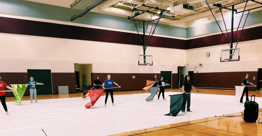 The St. Charles West Winter Guard during their warmup.