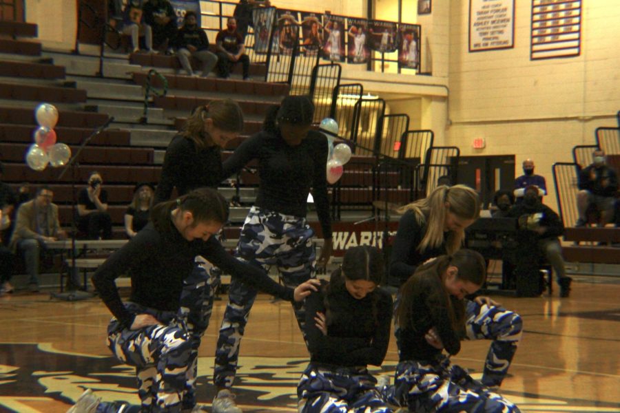 Dance and drill at the end of their performance.